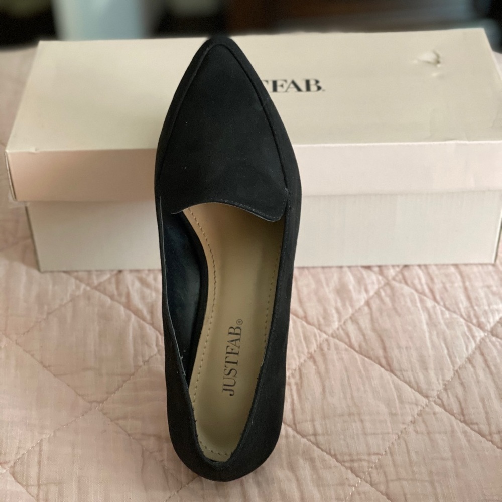 Black pointed loafers